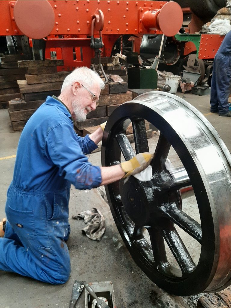 Simeon Dixon cleans 5643's radial wheelset in readiness for painting