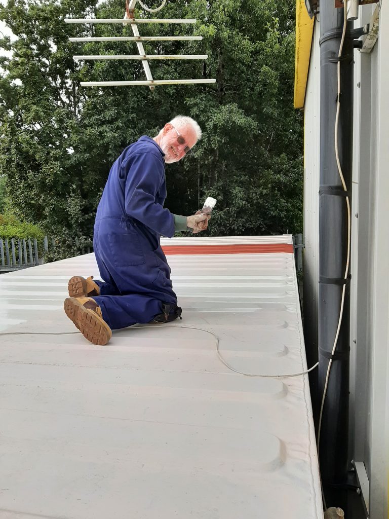 Sim painting the mess room roof