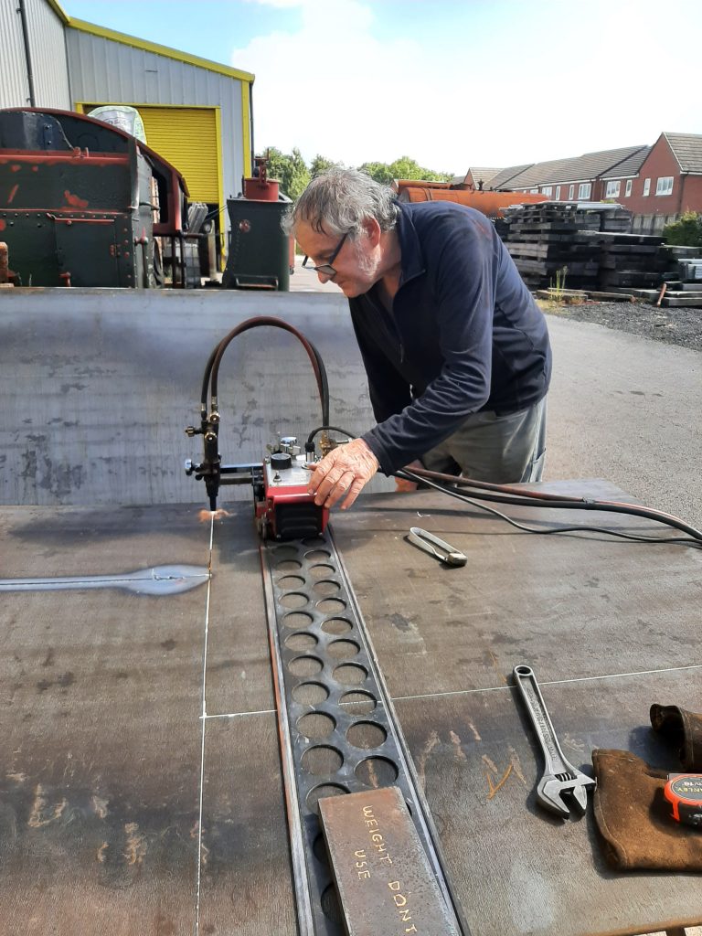 Keith cuts some new steel plate for 5643 and 4979