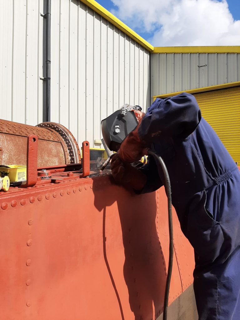 John Dixon at work on one of 5643's side tanks