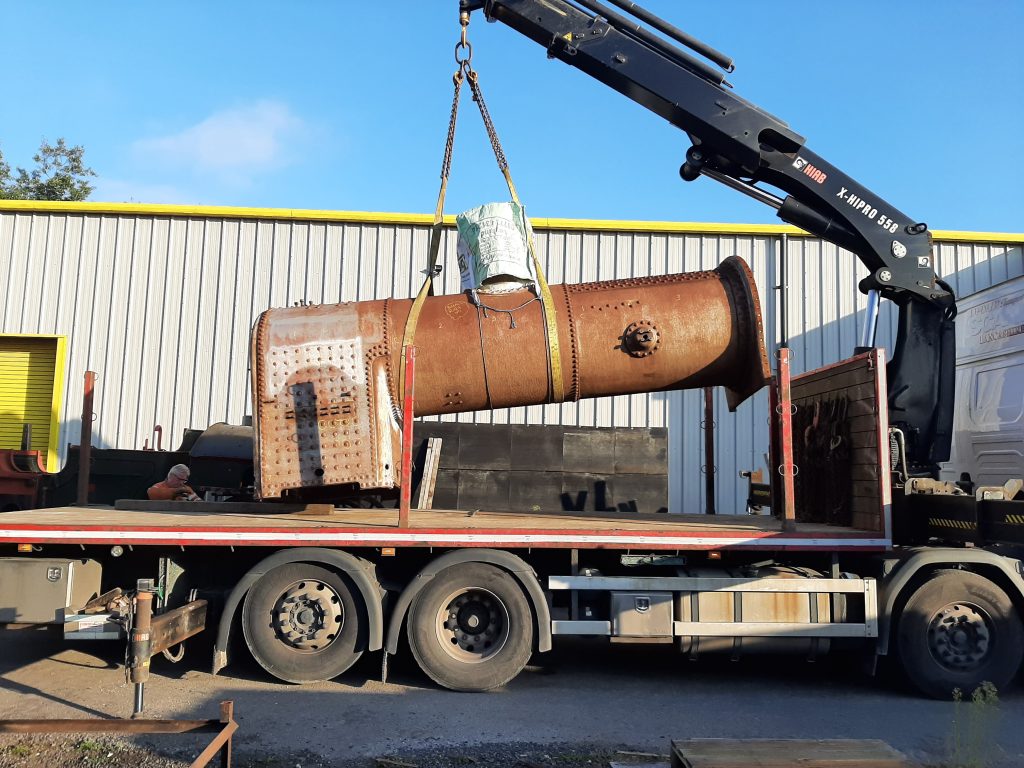 Caliban's boiler is loaded onto the hi-ab lorry for transportation to Williton