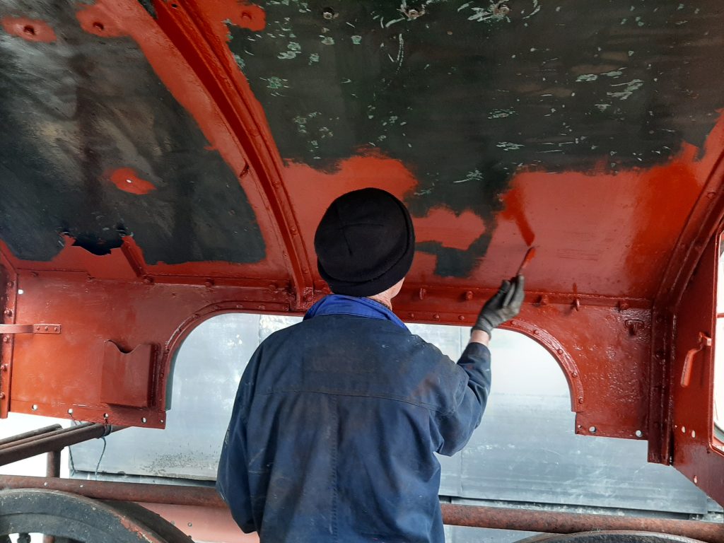 Brother Jon painting in 5643's cab