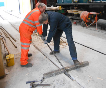 Keith Ray and Mike Rigg trying to extract the shuttering from the concrete
