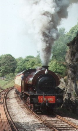 "Cumbria" shows typical character as it climbs the fearsome Backbarrow bank on the Lakeside and Haverthwaite railway.