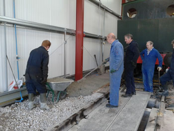 Creating the final pathway on the western end of the shed