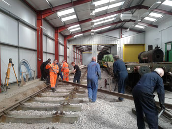 The gang assembles to move the second of the two rails on Wednesday